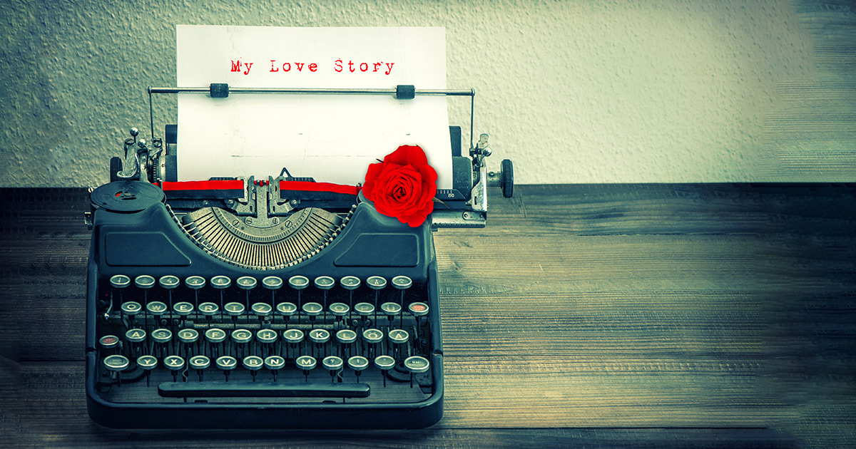 Typewriter with paper showing typed words saying My Love Story
